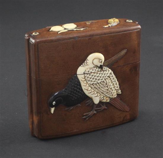 A Japanese cherrywood, ivory, horn, mother of pearl and wood inlaid single case inro, 19th century, 9cm.